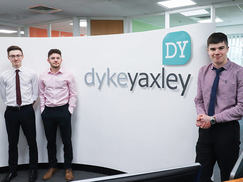 Three Accounting Apprenticeships in front of Dyke Yaxley sign