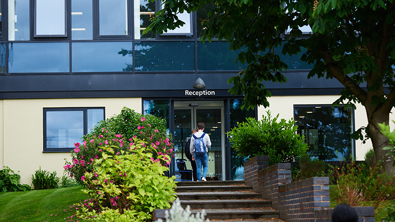 Students entering London Road Campus reception area