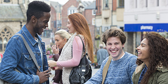 Students socialising in town centre