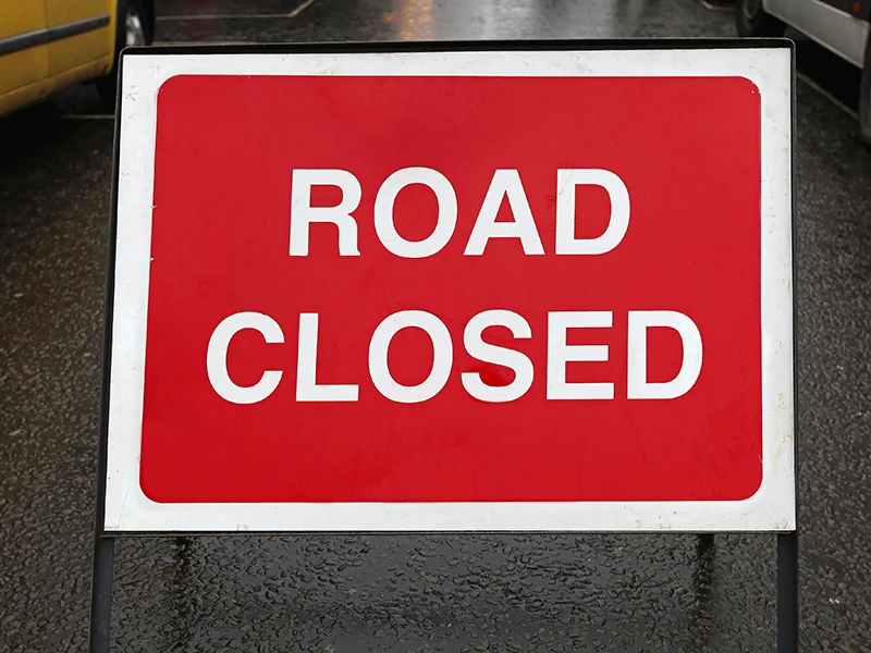 Road closed sign on tarmac