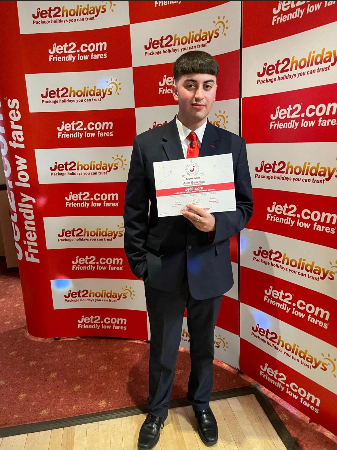 SCG student poses with his Jet2 certificate
