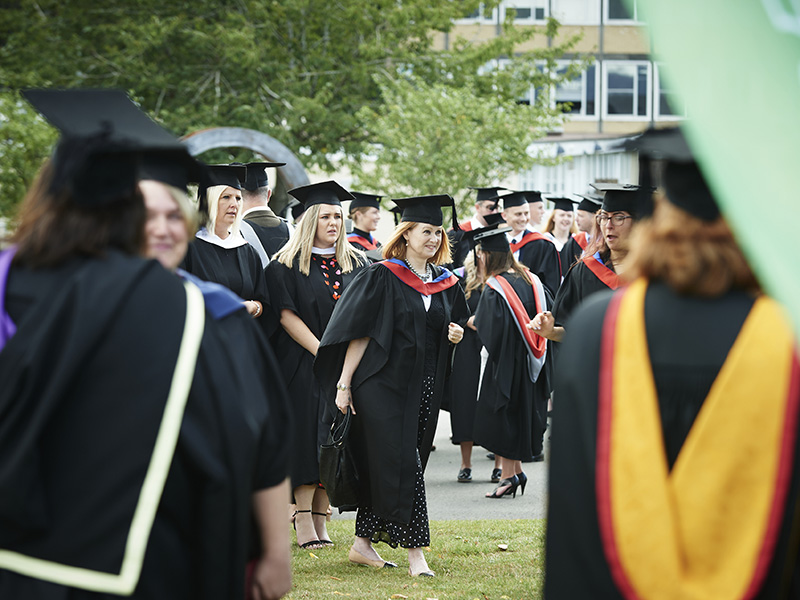 Students wearing caps and gowns
