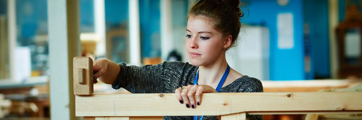 A carpentry apprentice learning in our state of the art Engineering & Construction Centre